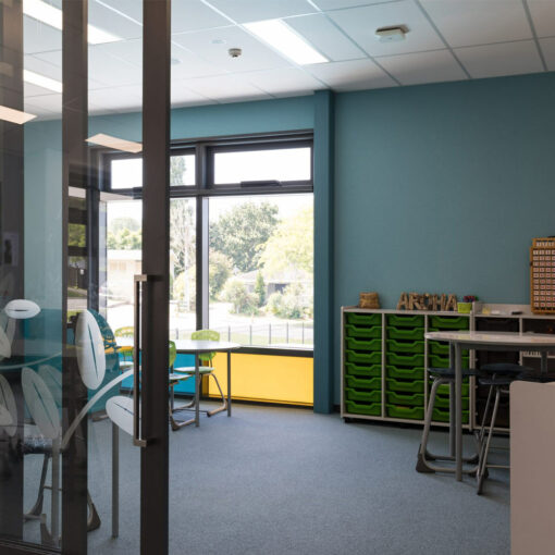 Autex composition acoustic panel on walls in a classroom
